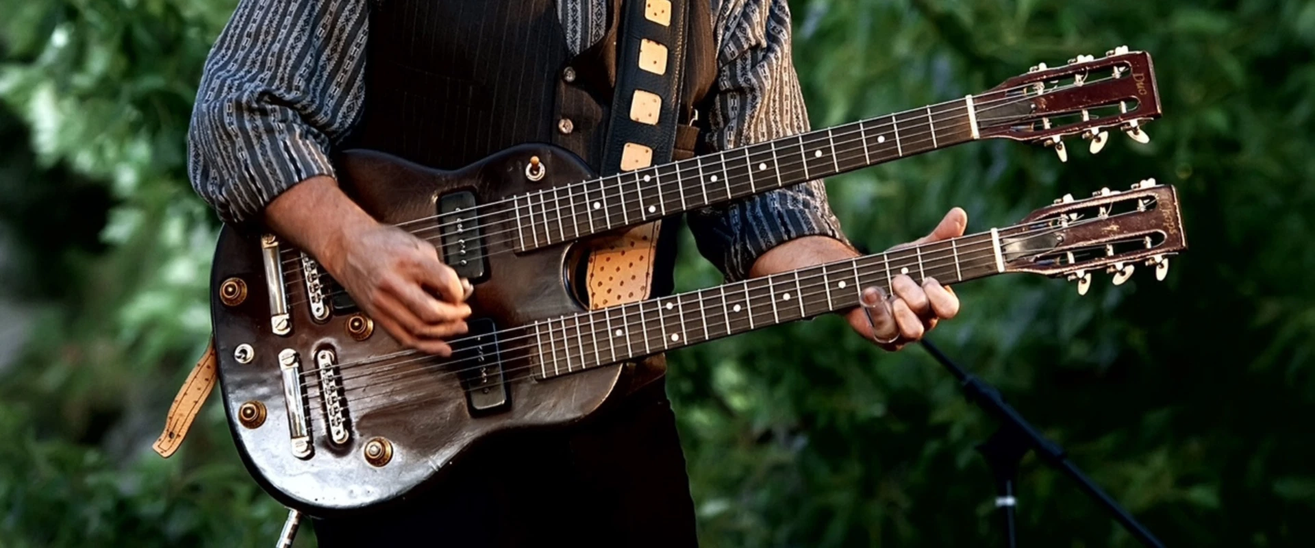 a person playing a guitar