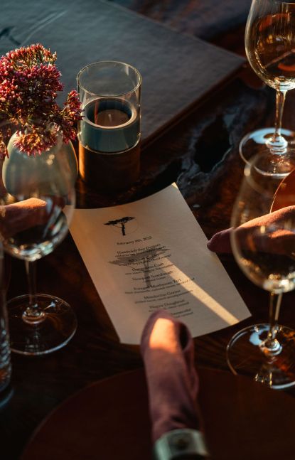a person holding a menu