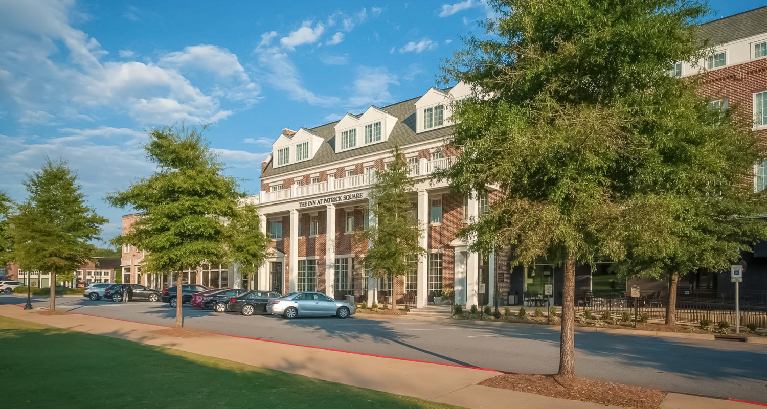 a building with cars parked in front of it