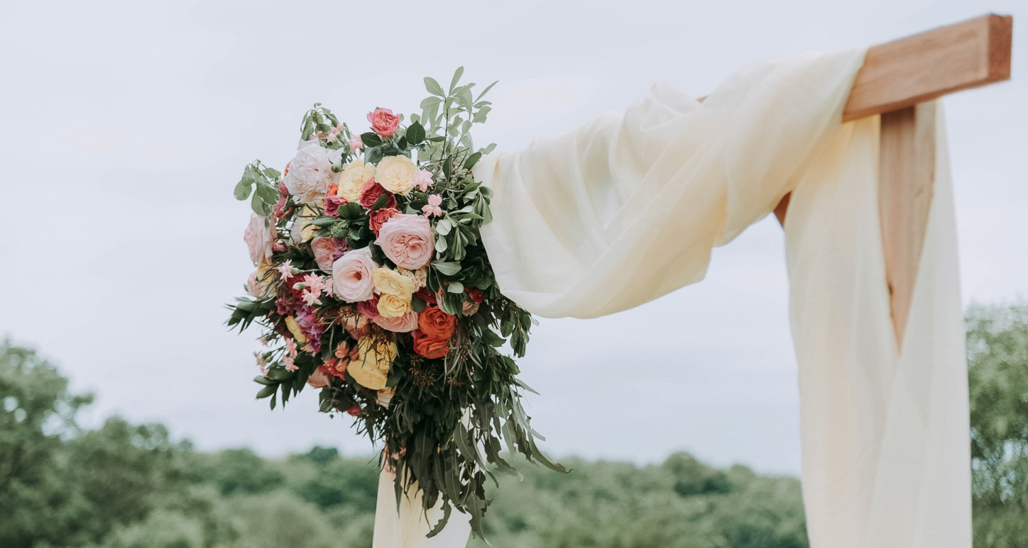 a person holding a bouquet of flowers