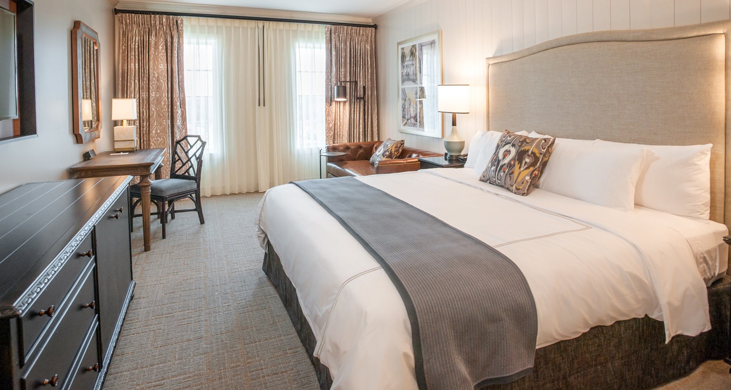 a bed in a hotel room