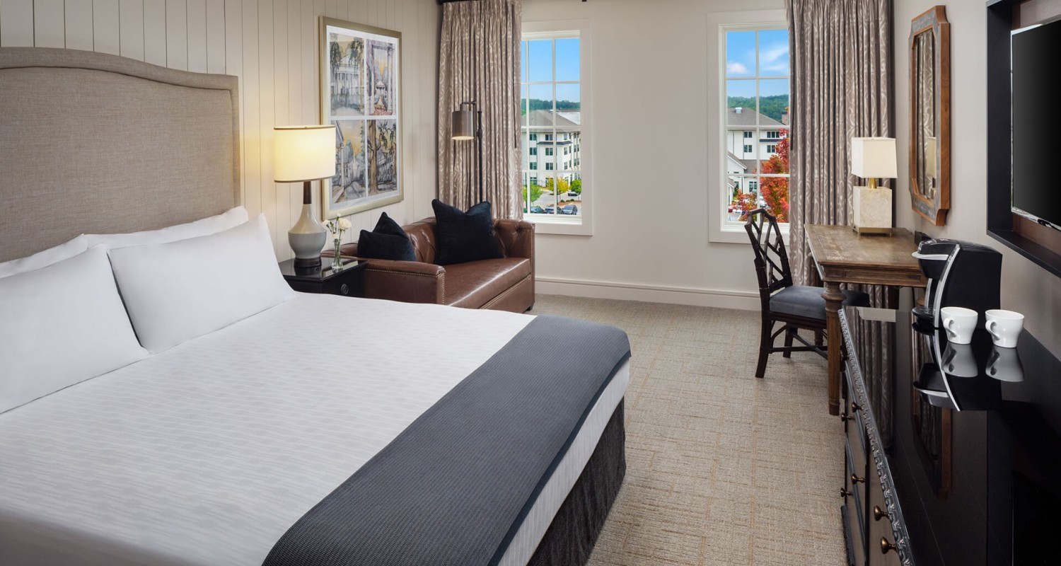 a room with a bed and a couch