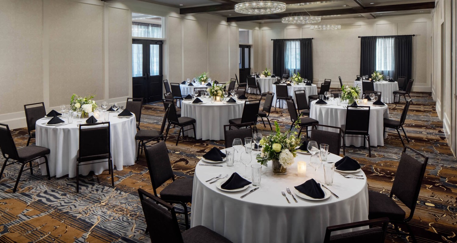 a room with tables and chairs