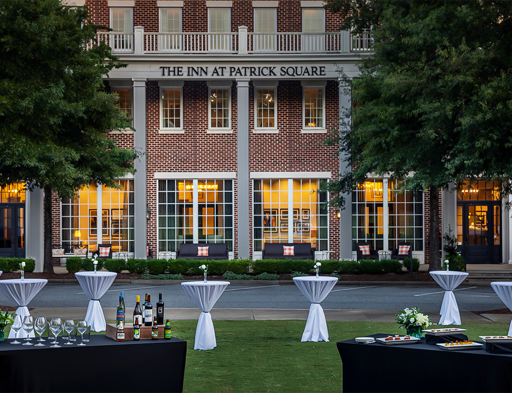 a table set up for a party outside of a building
