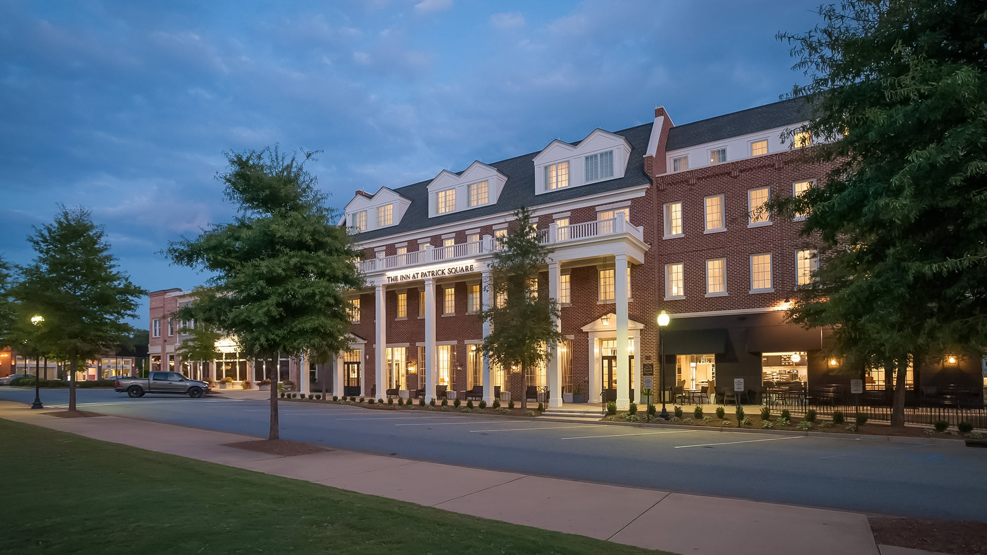 a building with many windows and a street