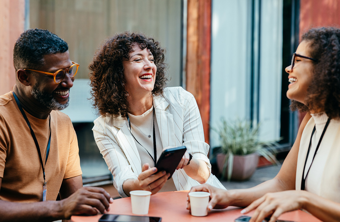 a group of people sitting at a table
