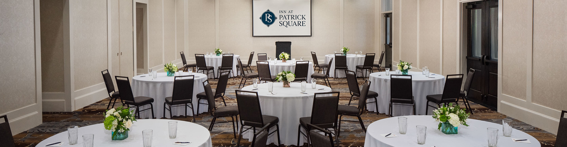 a room with tables and chairs