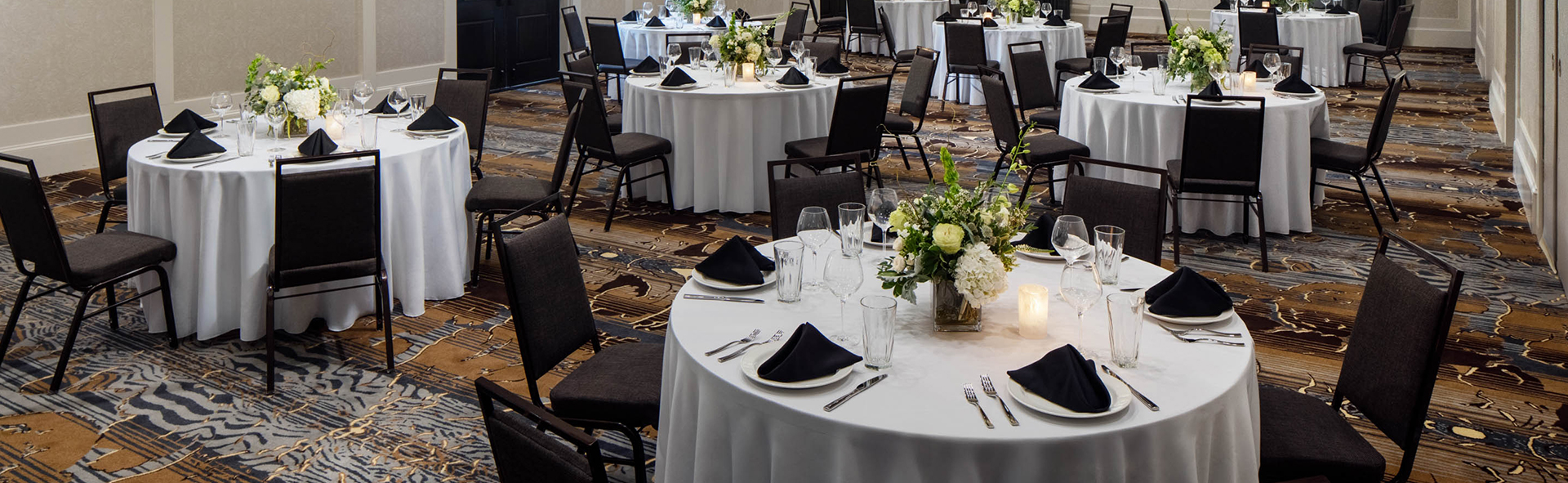 a group of tables set up for a party