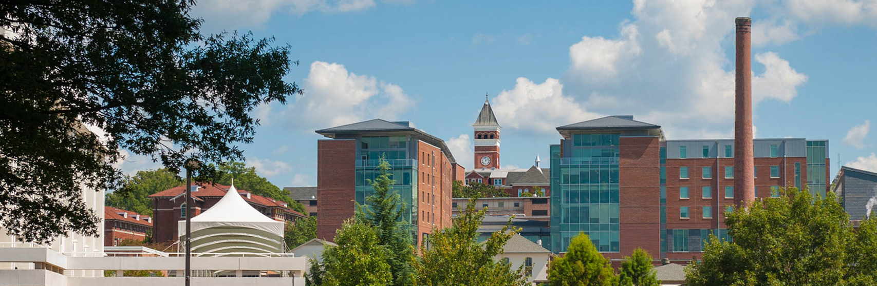 a group of buildings with a clock tower
