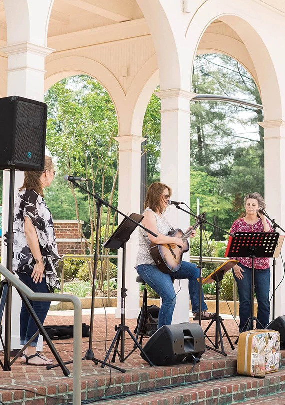 a group of women playing instruments