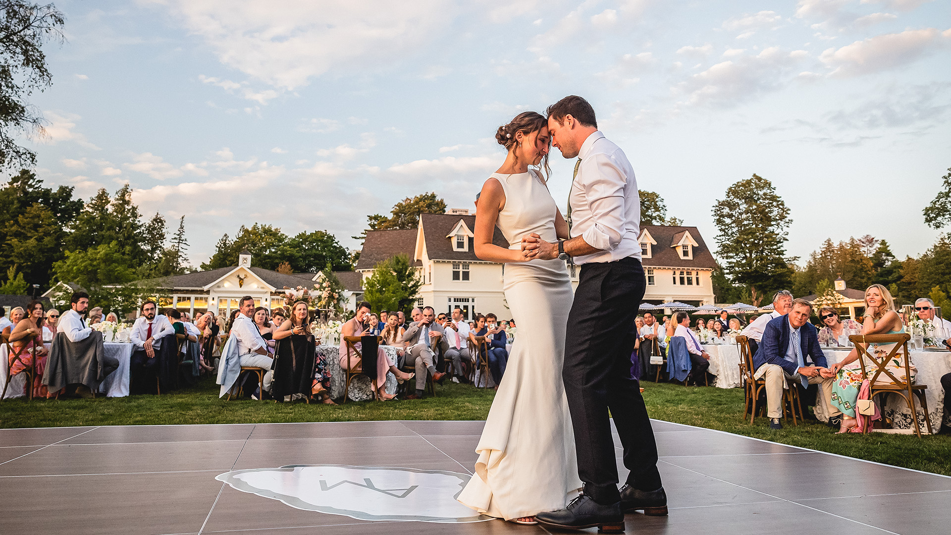 a man and woman dancing on a stage