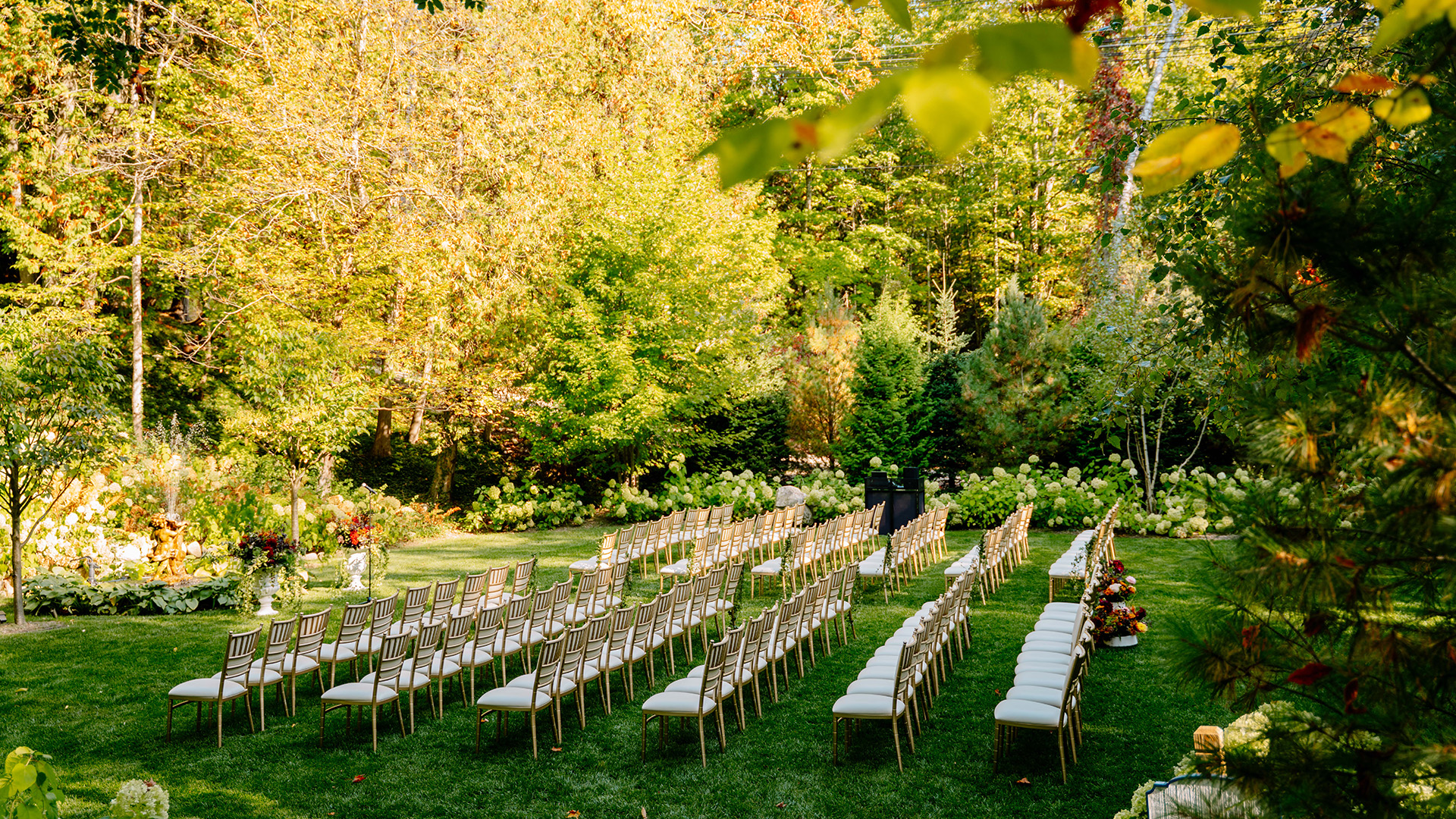 rows of chairs in a garden