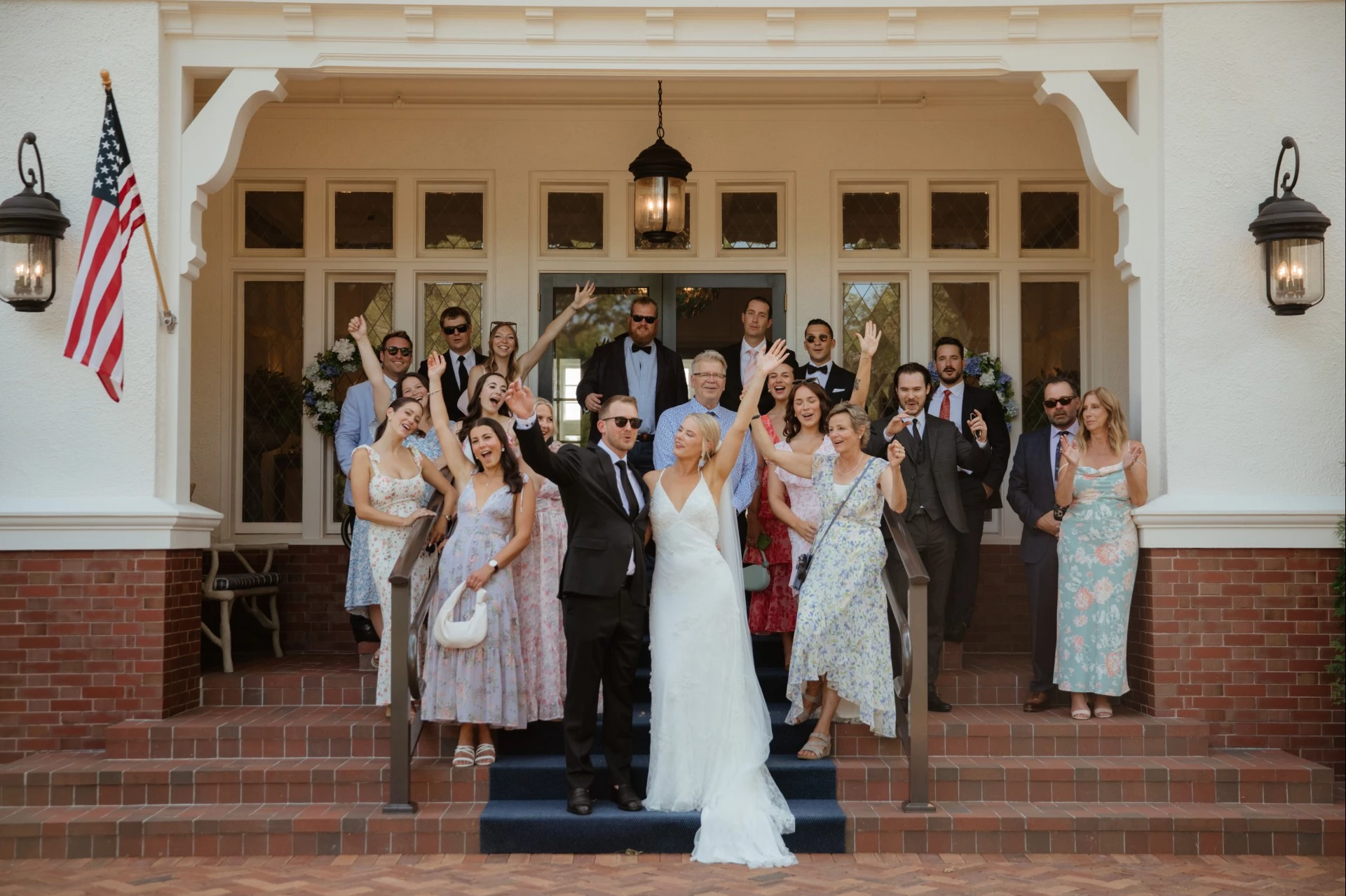 a group of people standing on stairs outside a building