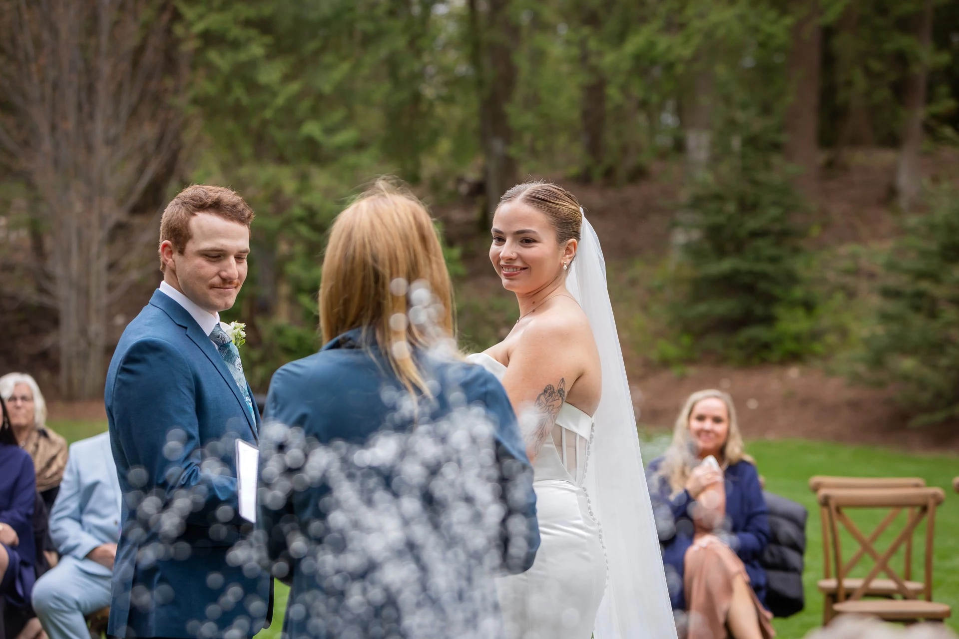 a woman in a white dress and a man in a suit