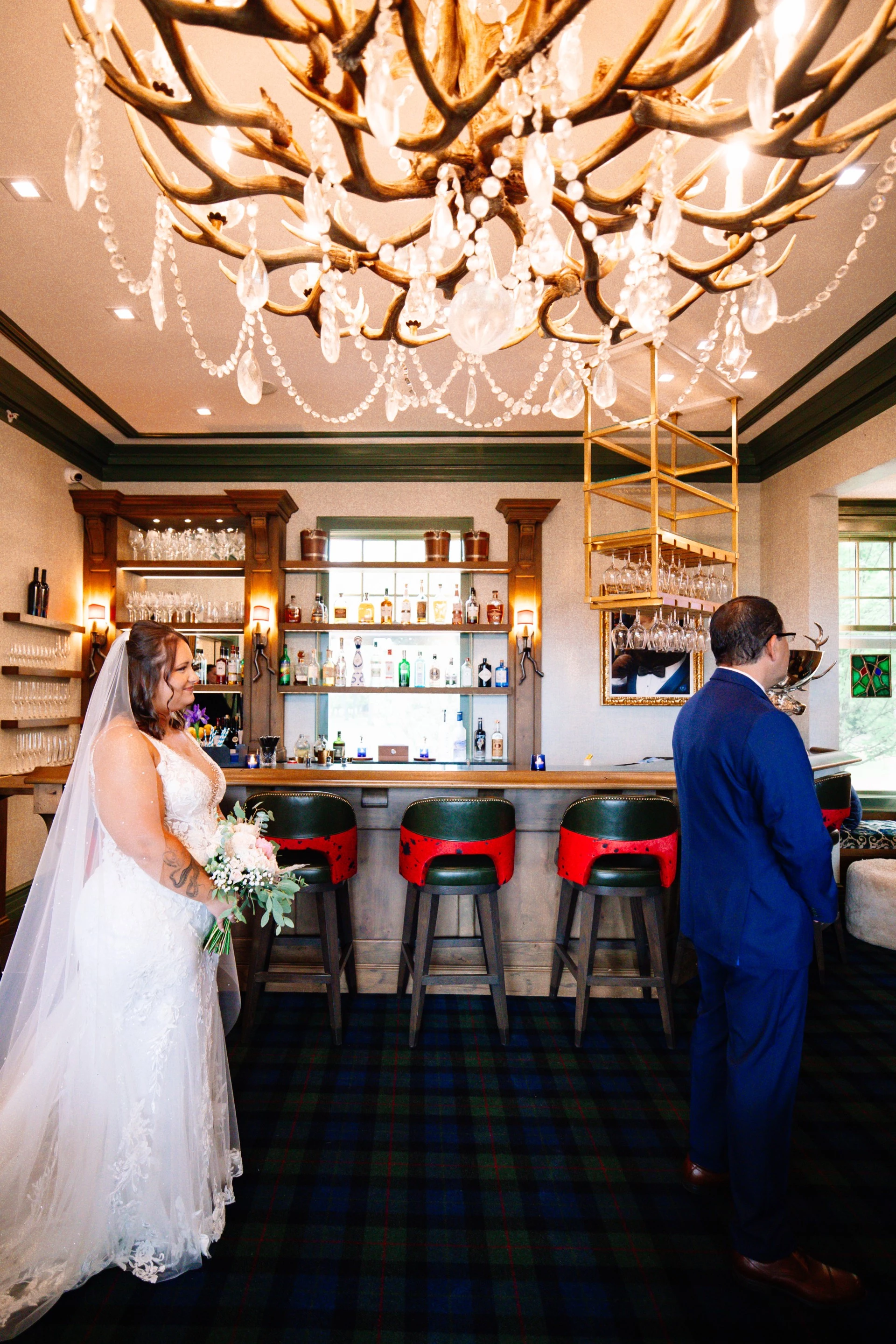 a bride and groom in a bar
