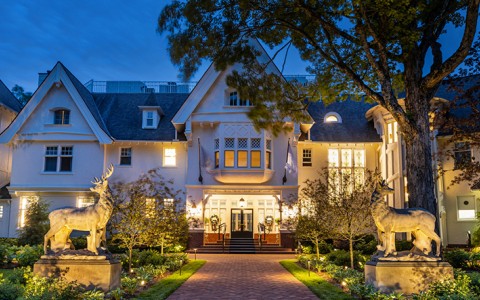 Historic Mansion lit up at night on Mackinac Island
