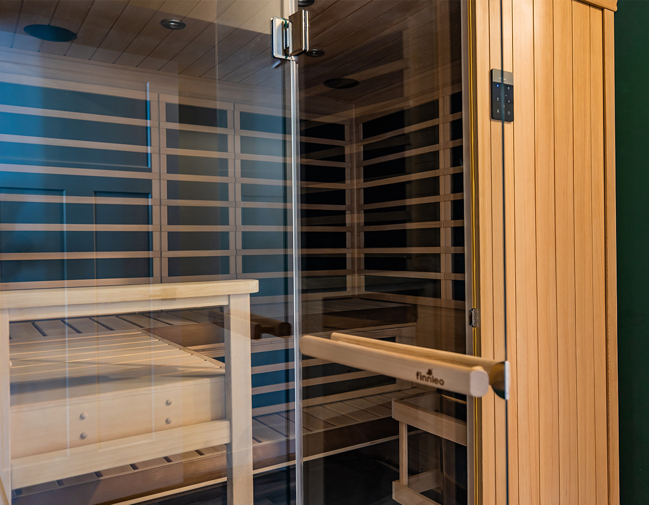 a glass door of a sauna