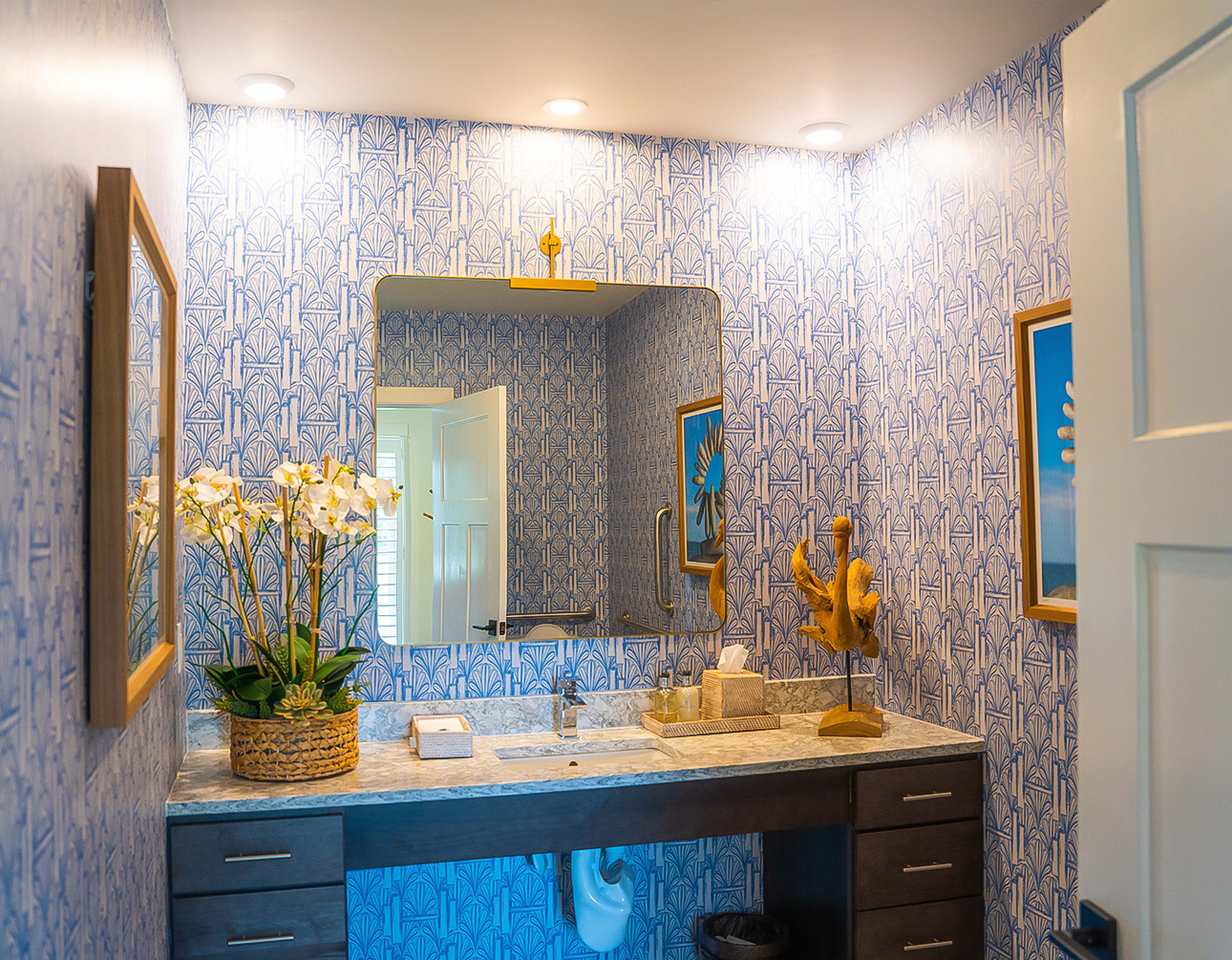a bathroom with a mirror and a sink