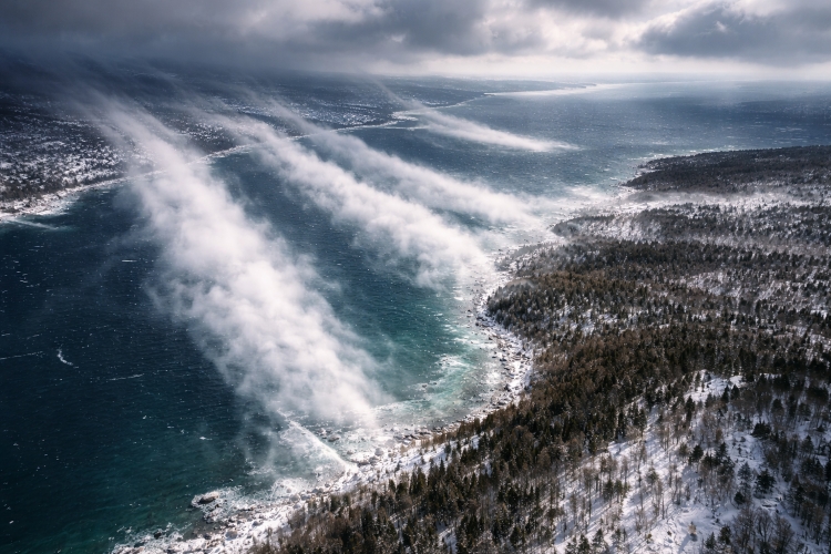 Lake-effect snow bands forming over Lake Michigan and moving toward Northern Michigan during a March winter storm.