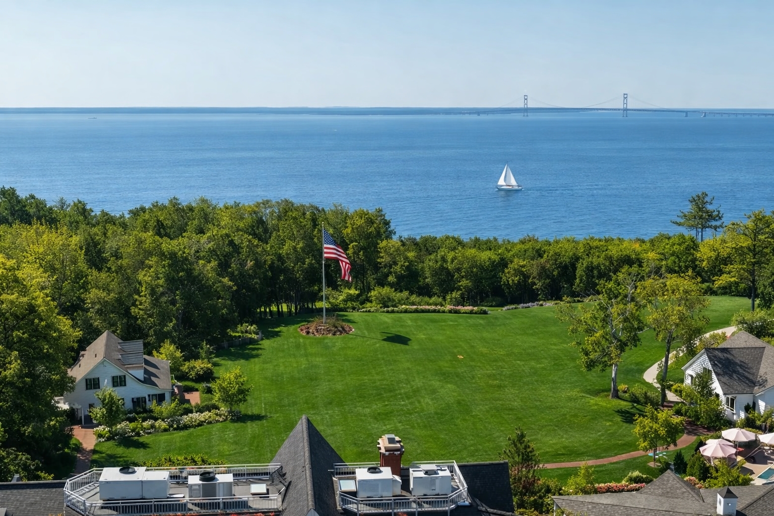 Spring view of Mackinac Island in May overlooking Lake Huron and the Mackinac Bridge from The Inn at Stonecliffe blufftop resort