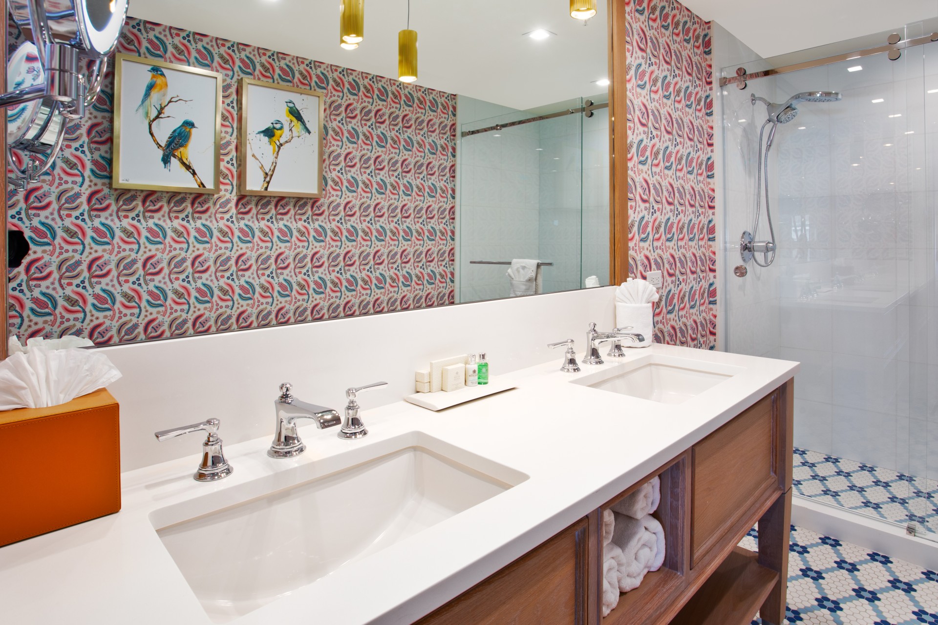 a bathroom with a mirror and sinks