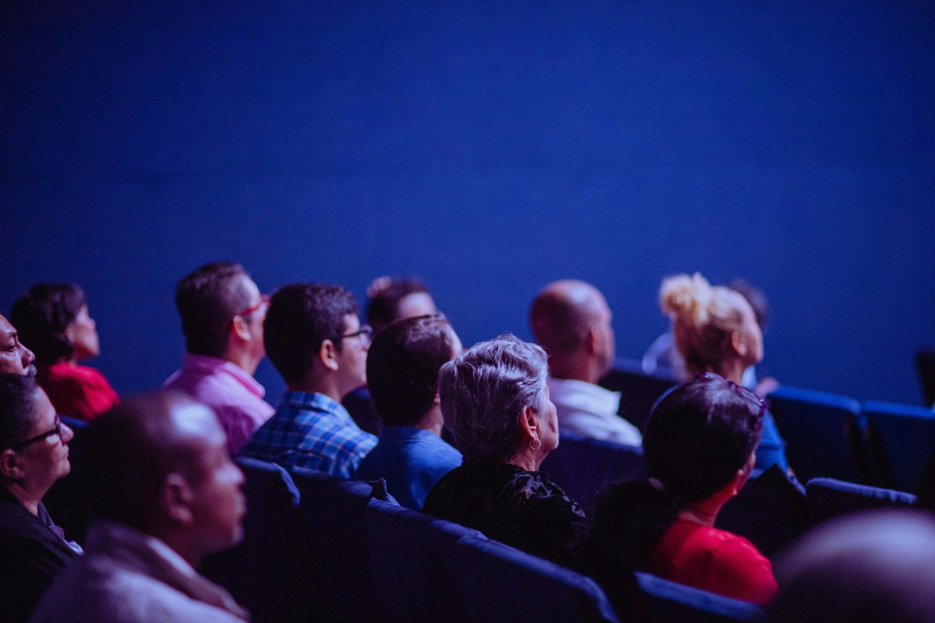 a group of people sitting in a room