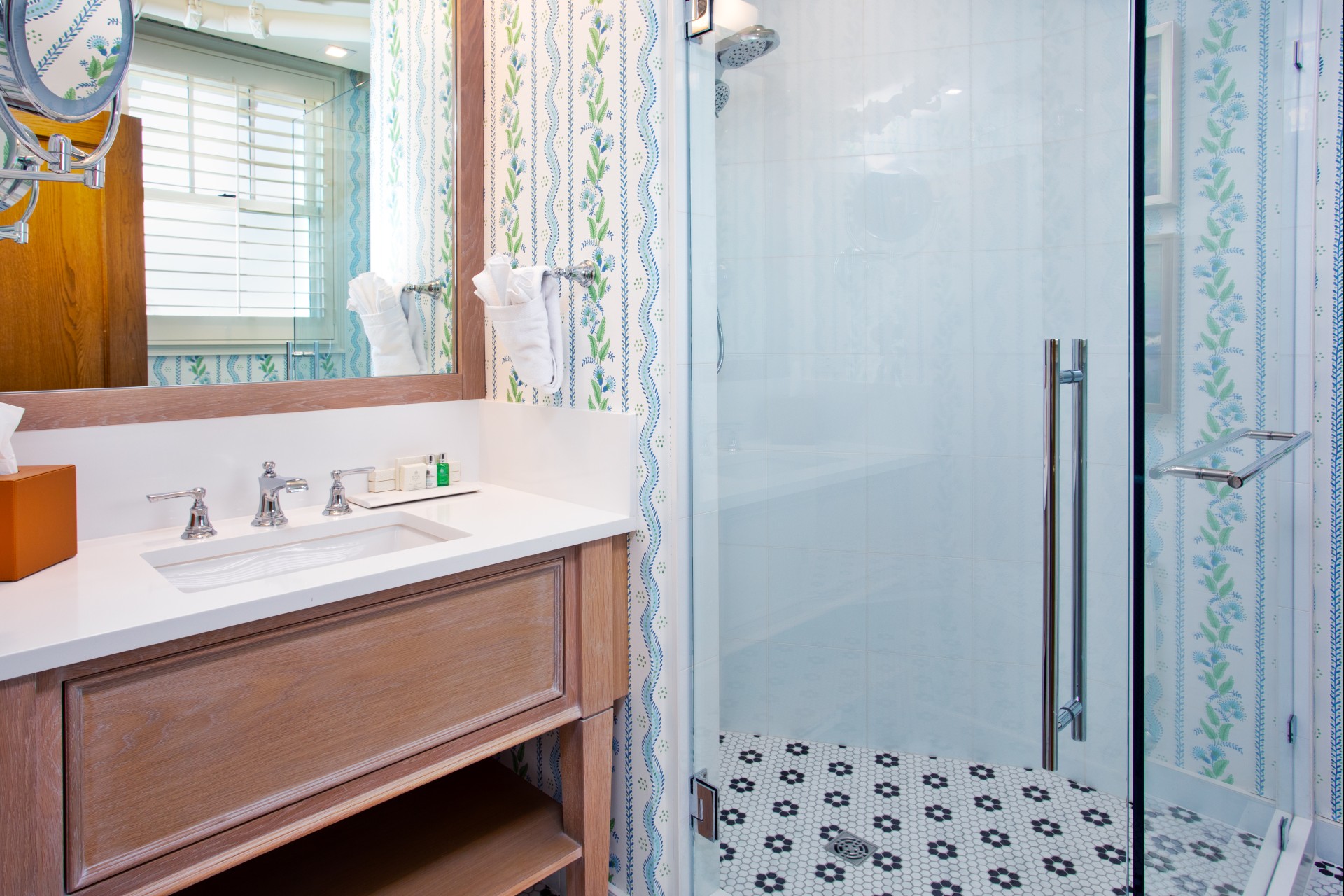 a bathroom with a shower and sink