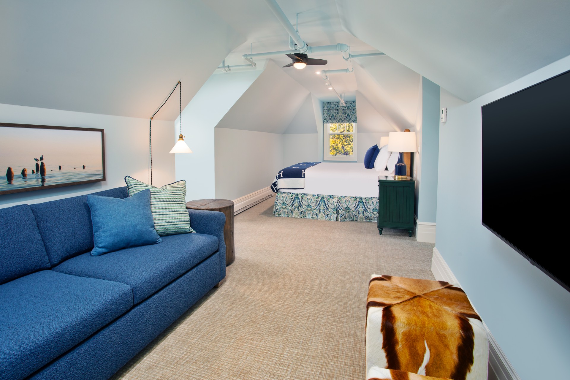 a room with a bed and a couch