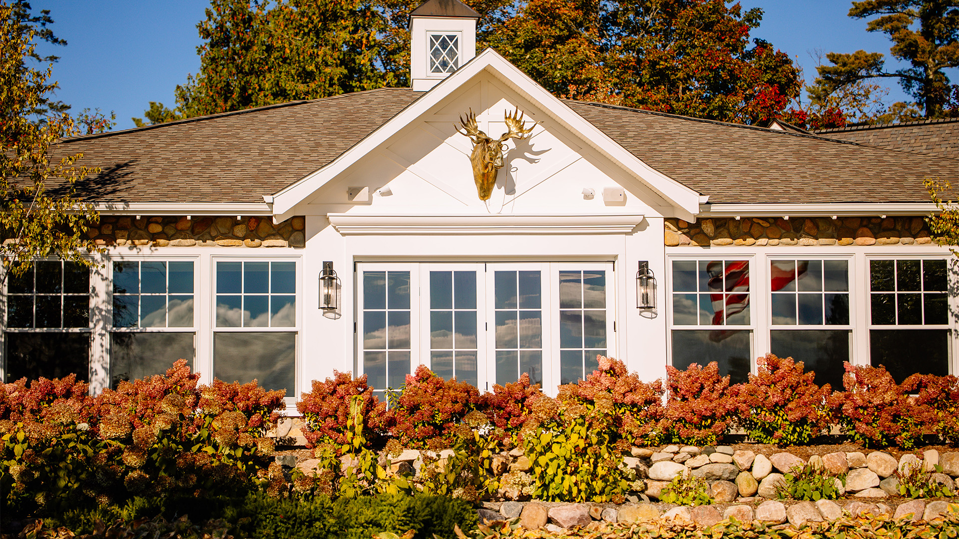 a house with a deer head on the front