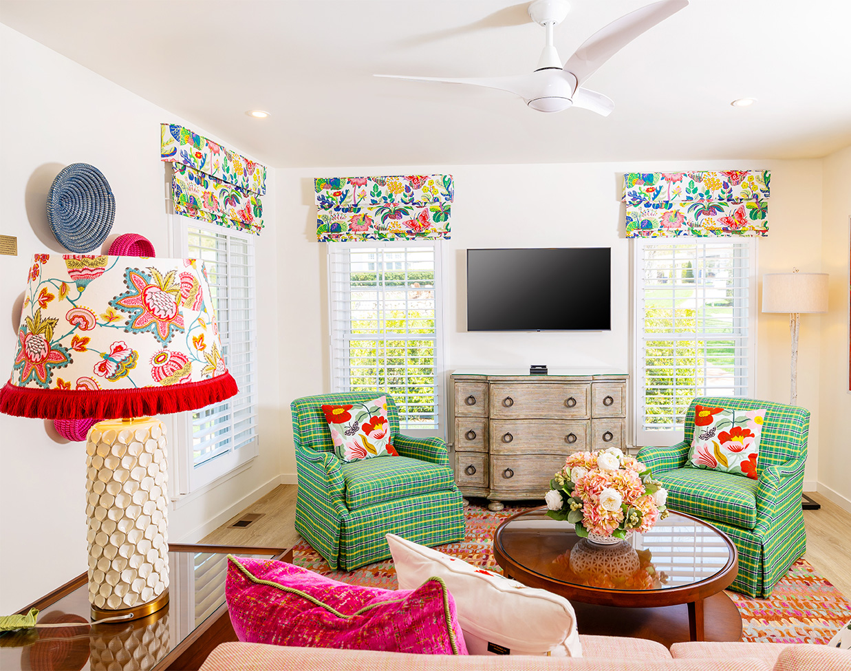 Colorful cottage sitting room with plaid armchairs at The Inn at Stonecliffe, one of the refined Mackinac Island hotels.