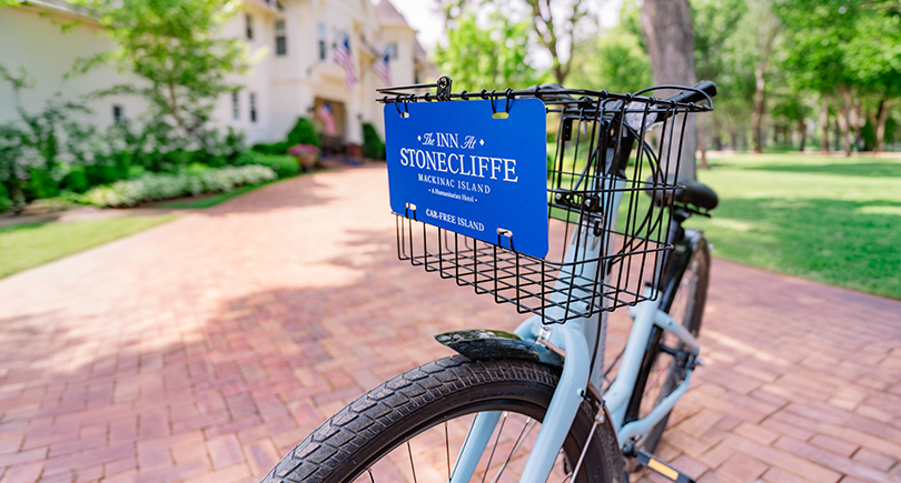 a blue sign on a bicycle