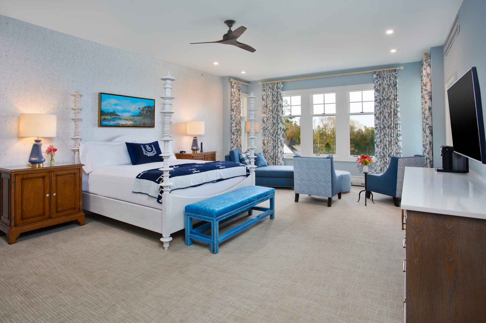 a bedroom with a bed and a couch