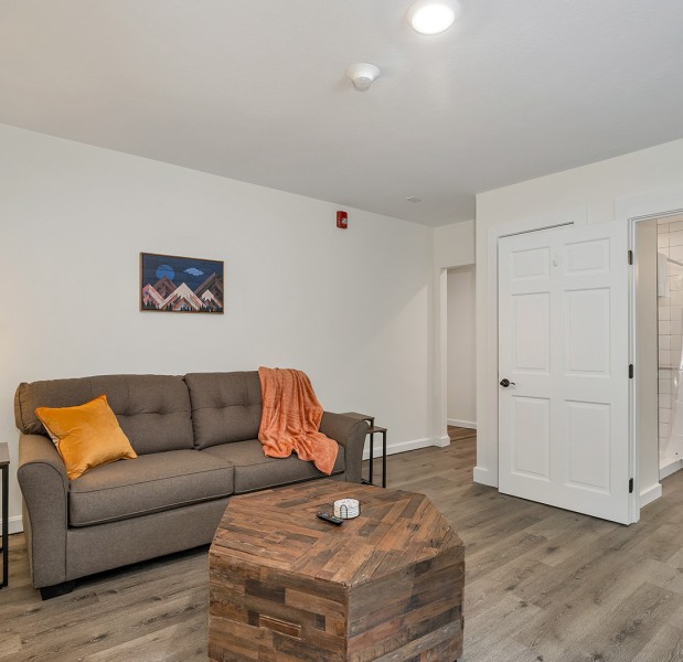 a living room with a couch and a coffee table