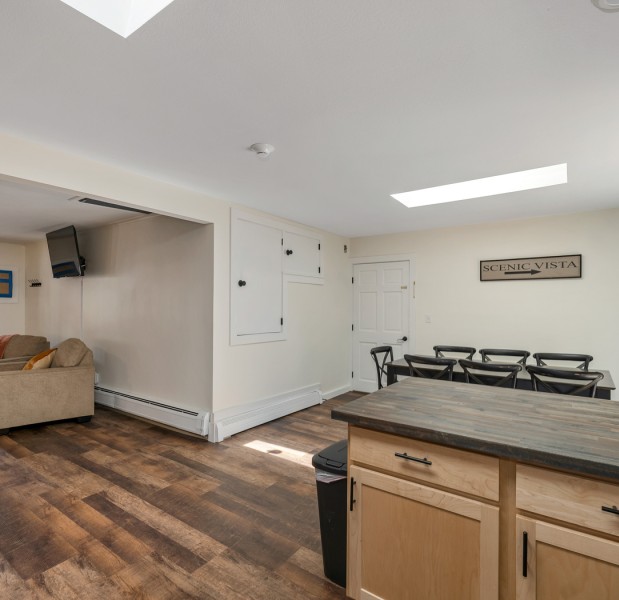 a room with a table and chairs