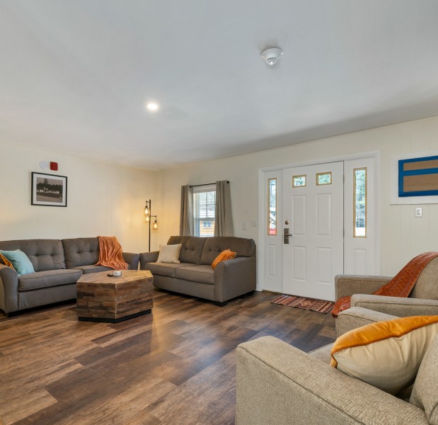 a living room with a wood floor