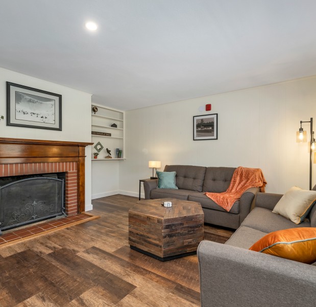 a living room with a fireplace
