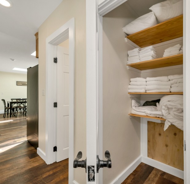 a room with a bunk bed and a door