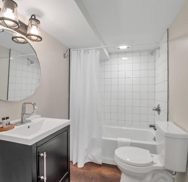 a bathroom with a large mirror