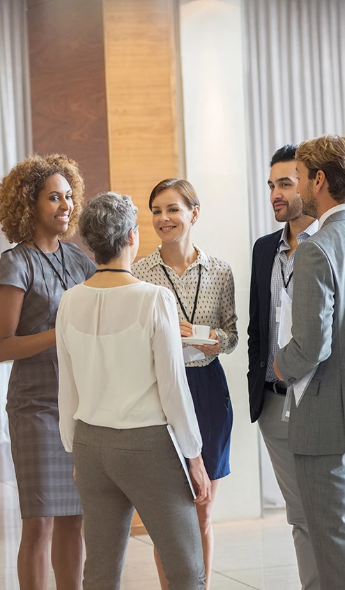 a group of people standing in a room