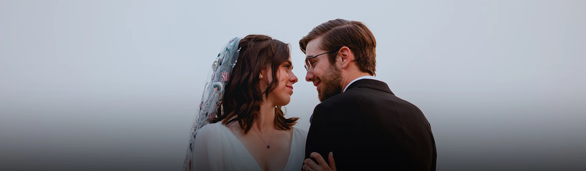 a man and woman looking at each other