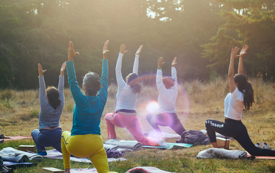 a group of people doing yoga