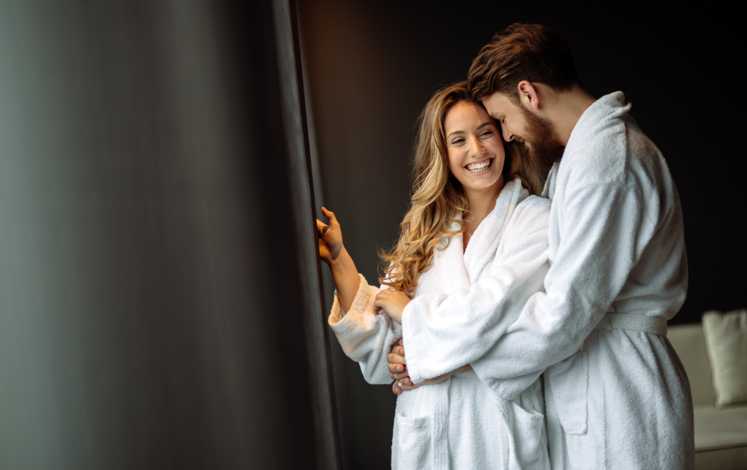 a man and woman kissing