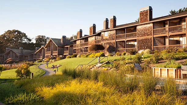 a building with many balconies and a walkway