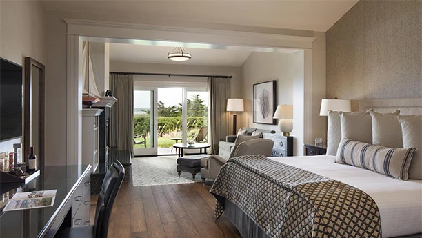 a room with a fireplace and a bed