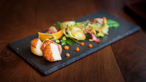 food on a black plate