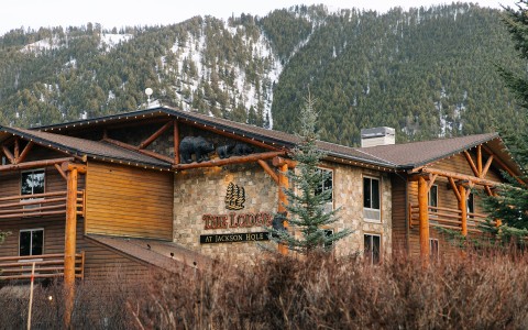 a building with a mountain in the background