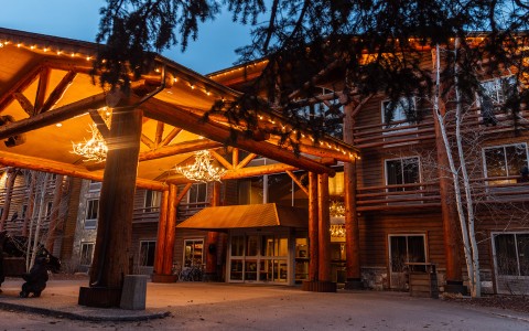 a building with lights on the front entrance