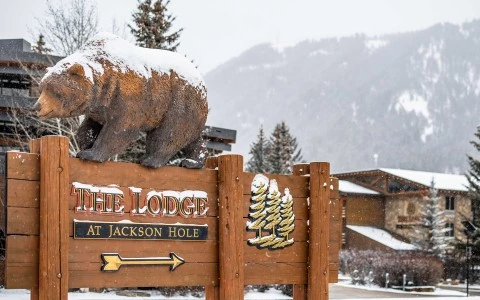 a sign with a bear on top of it