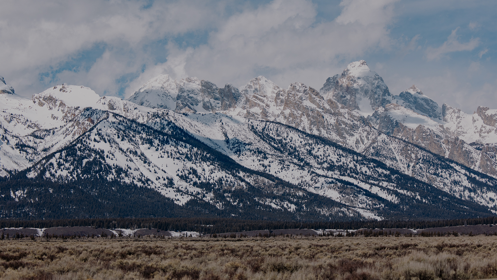 sharp mountain tops with snow on them