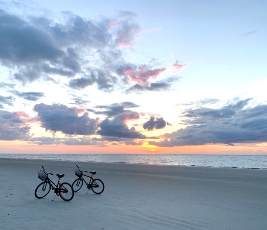 two bicycles on a beach